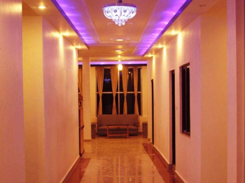 Hotel Hill Palace Каусани Экстерьер фото
